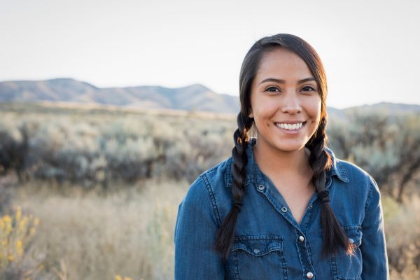 woman smiling towards viewer